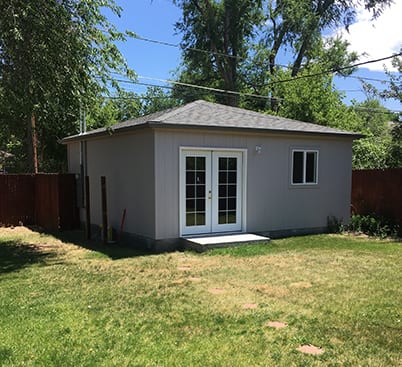 Small Detached Garage in Denver - 22x22, hip roof, t-111, 12" overhangs, 4/12 pitch, 6' double door with glass